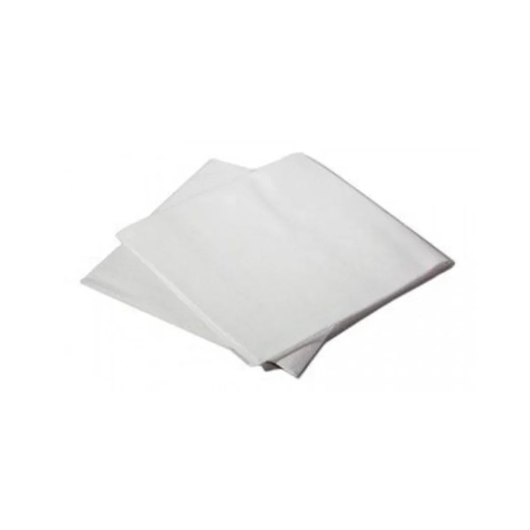 Stack of folded white disposable paper napkins
