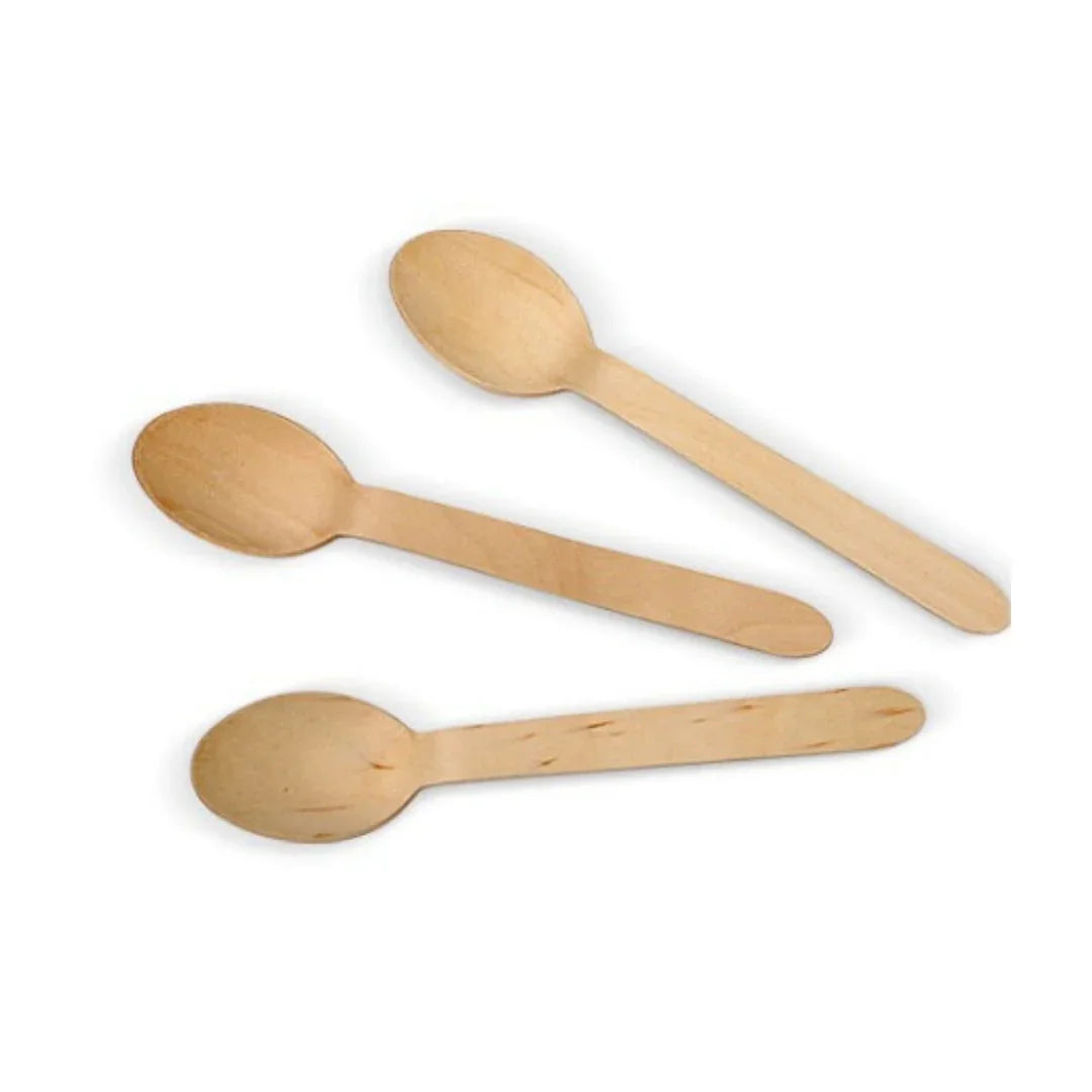 Three disposable wooden spoons arranged diagonally on a white background
